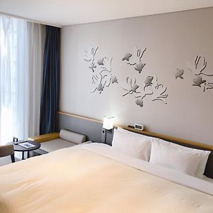 Habitación Mejor Disponible Asignada a la Llegada